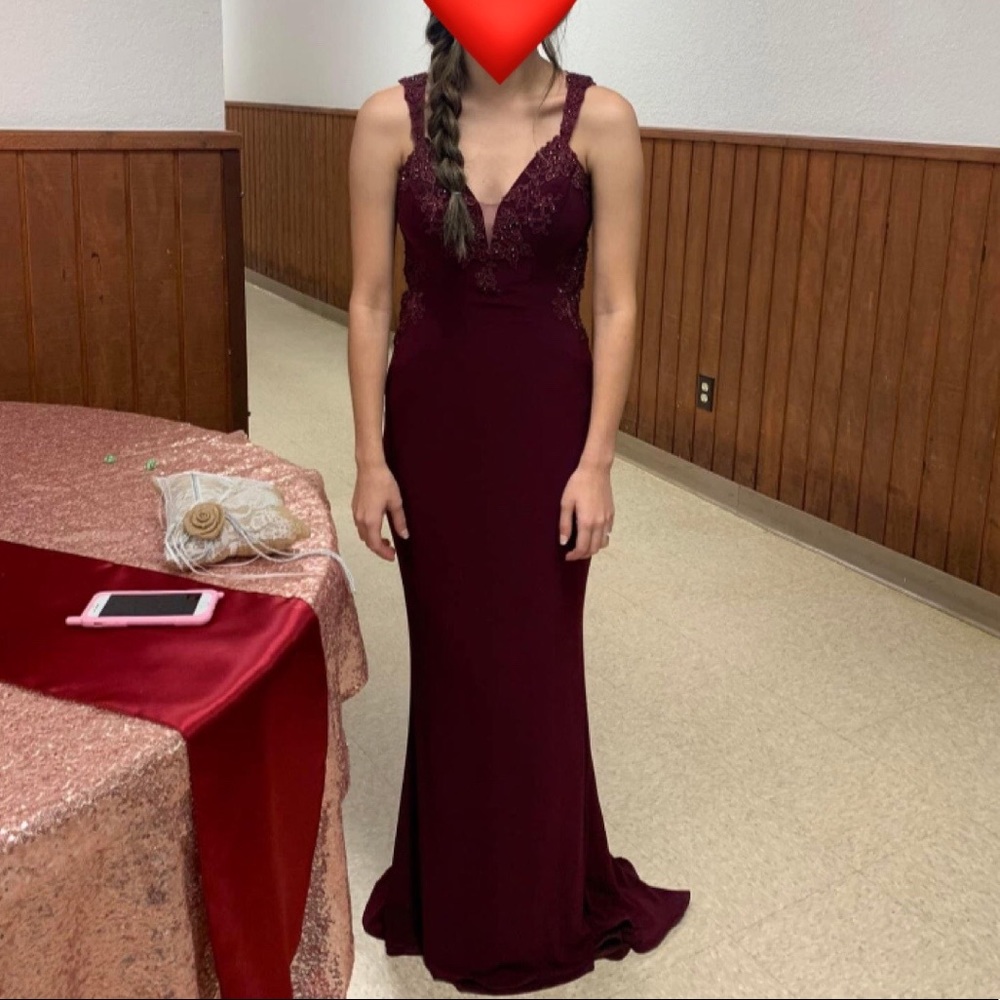 burgundy bridesmaid’s dress.